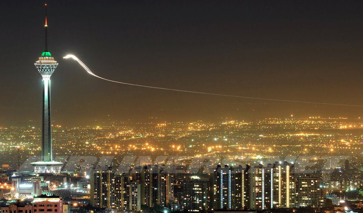 Glowing UFO Examines Tower In Tehran, Iran on Jan 2012 Photos